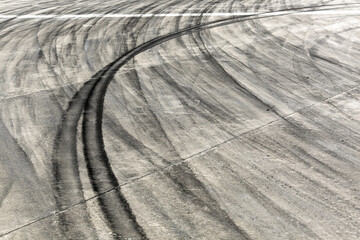 Background with tire marks on road track, Car track asphalt pavement background at the circuit,...