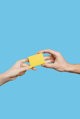 hands hold multi-colored handmade soap