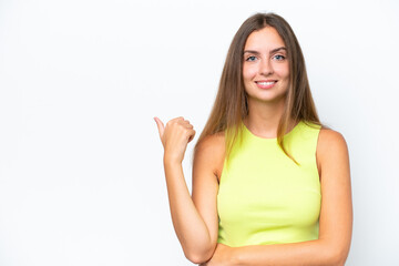 Young caucasian woman isolated on white background pointing to the side to present a product