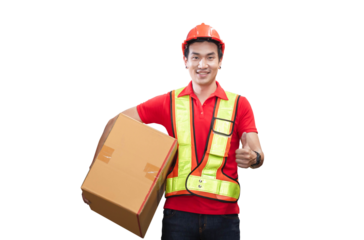 Male worker in hardhat holding cardboard box walking through in retail warehouse, Warehouse worker working in factory warehouse, Man carrying box and showing thumbs up