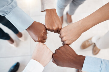 Fist bump, office team and hands together with diversity to show work community, trust and success....