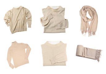 Set with different cashmere clothes isolated on white, top view