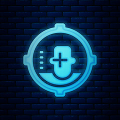 Glowing neon Headshot icon isolated on brick wall background. Sniper and marksman is shooting on the head of man, lethal attack, assault and assassination. Vector