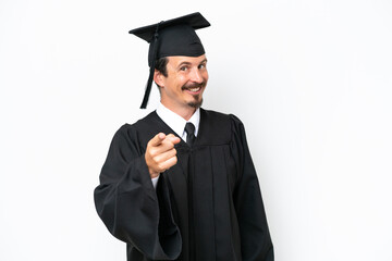 Young university graduate man isolated on white background points finger at you with a confident expression