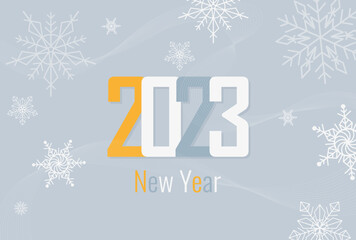 text happy new year 2023 on light blue background with snowflakes