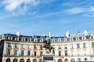 Fototapeta na wymiar Statue of King Louis XIV at Place des Victoires square in Paris, France, Europe
