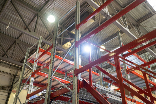 Warehouse mezzanine. Steel stacked storage structure. Mezzanine for manufacturing company. Systems for distributed storage goods. Mezzanine inside building. Warehouse furniture. Shelving system