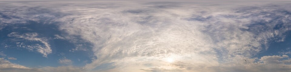 Dark blue sunset sky panorama with golden Cumulus clouds. Seamless hdr 360 panorama in spherical equirectangular format. Full zenith for 3D visualization, sky replacement for aerial drone panoramas.