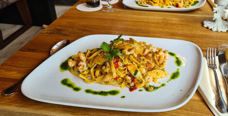 Tagliatelle with fresh chanterelles in mushroom sauce