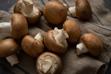 Raw fresh shiitake mushrooms  on kitchen textile vegan food