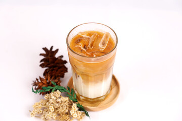 Iced coffee with milk on white background