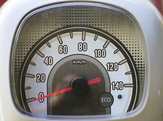 white speedometer red speed indicator