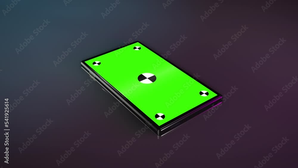 Poster green screen with tracking matte on smartphone screen lying on table