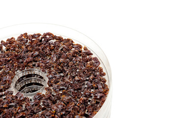 Dark-colored raisins from grapes made in a special drying round shape.