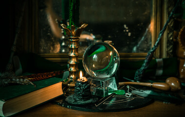 Illustration of magical stuff....candle light, book of spells, magical atmosphere, wizards school,...