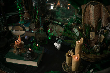 Illustration of magical stuff....candle light, book of spells, magical atmosphere, wizards school, green aesthetic, Halloween time