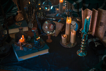 Obraz na płótnie Canvas Illustration of magical stuff....candle light, book of spells, magical atmosphere, wizards school, green aesthetic, Halloween time