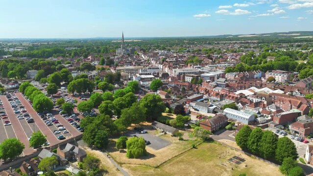 Chichester, UK: Aerial view of city in England, Cathedral Church of the Holy Trinity on horizon, summer day with clear blue sky - landscape panorama of United Kingdom from above