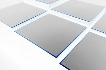 White X-ray look radiating boxes with small blue bevel. Product advertising marketing background. Various heights in stages. Close up