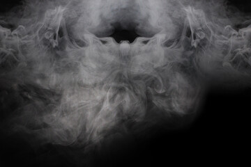 White steam on a black background.