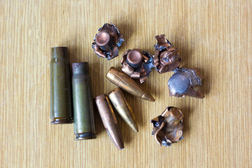 Bullets, shell casings, crumpled bullets from impact close-up