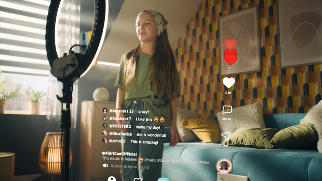 Girl dancing and singing on online stream, watching video, changing filters, making content in mobile app, filming trend video. 3D projection hologramm social network interface with comments and likes