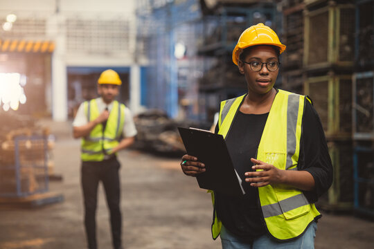 African women black lady engineer staff worker working in factory industry
