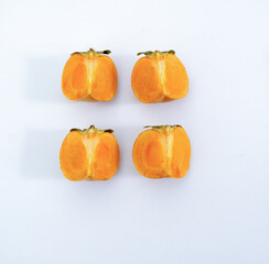 fresh ripe persimmons isolated on white background