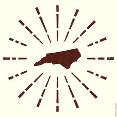 North Carolina Logo. Grunge sunburst poster with map of the us state. Shape of North Carolina filled with hex digits with sunburst rays around. Awesome vector illustration.