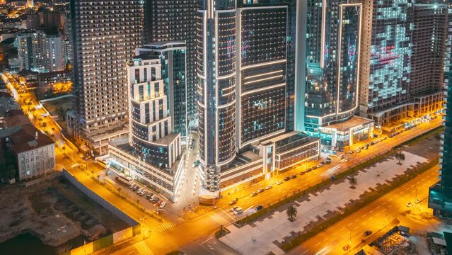 Street Night Time Lapse. 5k Night View Scenic Of highrise houses timelapse time lapse. City Traffic and highrise houses. Elevated View Cityscape Skyline. Night Light Lighting timelapse. Night Yellow