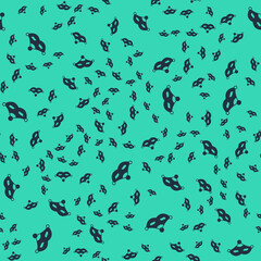 Black Carnival mask icon isolated seamless pattern on green background. Masquerade party mask. Vector