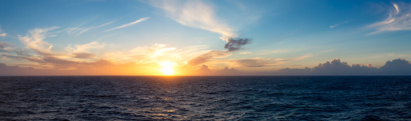 Naklejka na ściany i meble Dramatic Colorful Sunset Sky over North Atlantic Ocean. Cloudscape Nature Background. Panorama