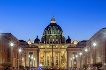 Fototapeta na wymiar Saint Peter square, in the Vatican City, Italy, Europe, as seen from Via della Conciliazione, during Christmas period. 