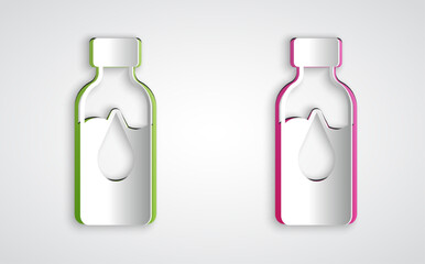 Paper cut Oil petrol test tube icon isolated on grey background. Cmemistry flask and falling drop. Paper art style. Vector