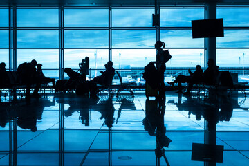 Airport silhouettes of business people