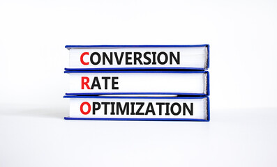 CRO conversion rate optimization symbol. Concept words CRO conversion rate optimization on books on a beautiful white background. Business CRO conversion rate optimization concept. Copy space.