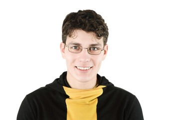 Handsome happy young guy wearing prescription glasses to improve vision on white background, boy smiling, happy that he can see well now, medical concept