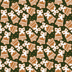 Seamless christmas pattern with gingerbread cookies on a green background.