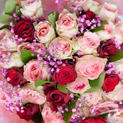 Fototapeta na wymiar Beautiful bouquet of roses. Background from pink roses.
