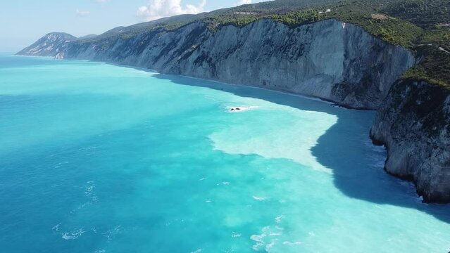 The beautiful turquoise blue color of the Ionian Sea that surrounds the Greek island of Lefkada and Potro Katsiki beach