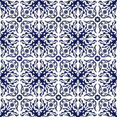 Seamless background image of vintage blue spiral flower vine kaleidoscope pattern.