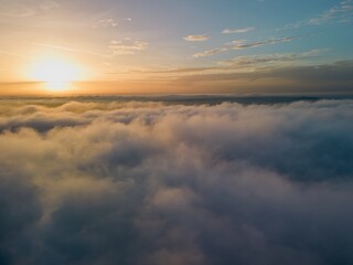 Sunset above the clouds, view from above