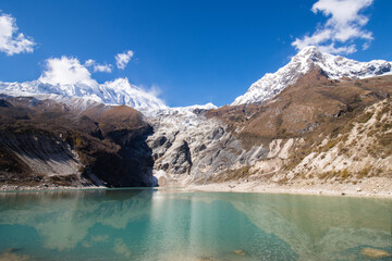 Fototapeta na wymiar Birendra lake with mt. manaslu in background, gorkha, manaslu circuit trek nepal