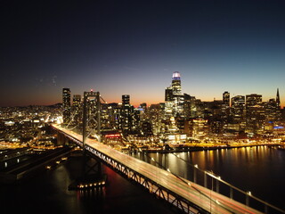 Obraz premium Bay Bridge in San Francisco at Night Aerial