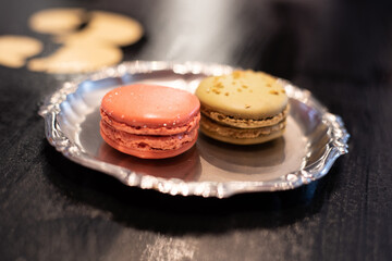 macaroons on a silver metal plate