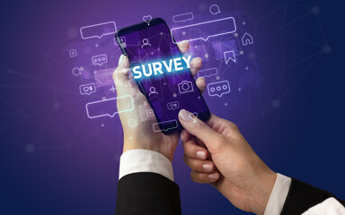 Hand using smartphone with social media concept