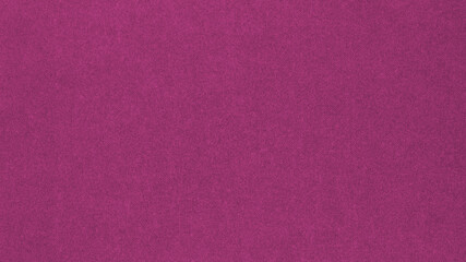 Dark pink colored paper texture. Tinted wallpaper. Textured background. Small patterned surface. Fibers and irregularities. Top-down