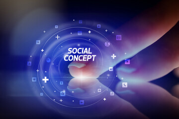 Finger touching tablet with social media icons concept