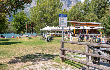 quiet shore at Lake Cavedine, a small lake in Trento province - Trentino Alto Adige - northern Italy, august 26, 2022