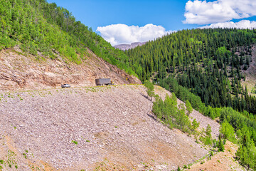 Colorado Million Dollar Highway 550 scenic road with San Juan rocky mountains peak view to...